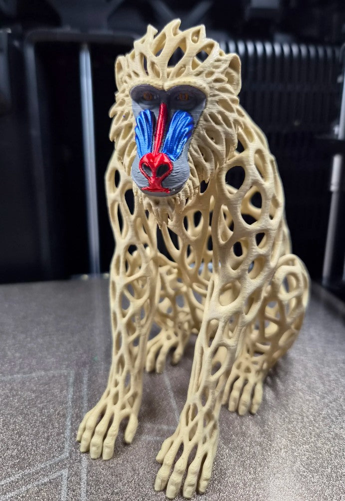 Multi-Color Voronoi Mandrill Baboon Sculpture with vibrant red and blue face markings