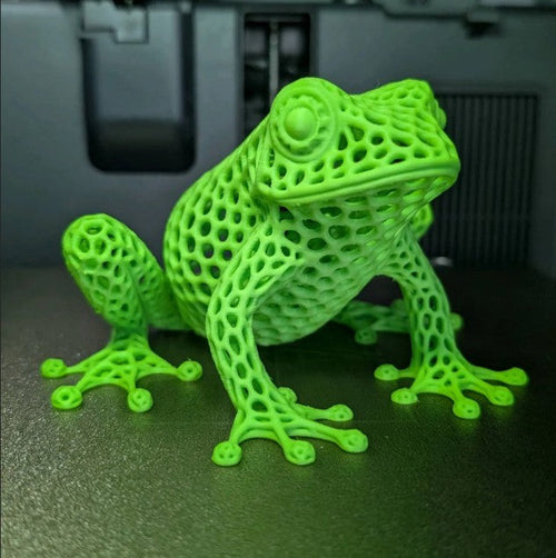 3D printed Voronoi tree frog sculpture in vibrant lime green with geometric lattice body and detailed suction-pad toes