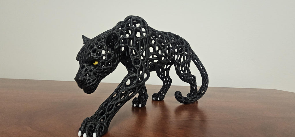 3D printed black voronoi panther sculpture side view