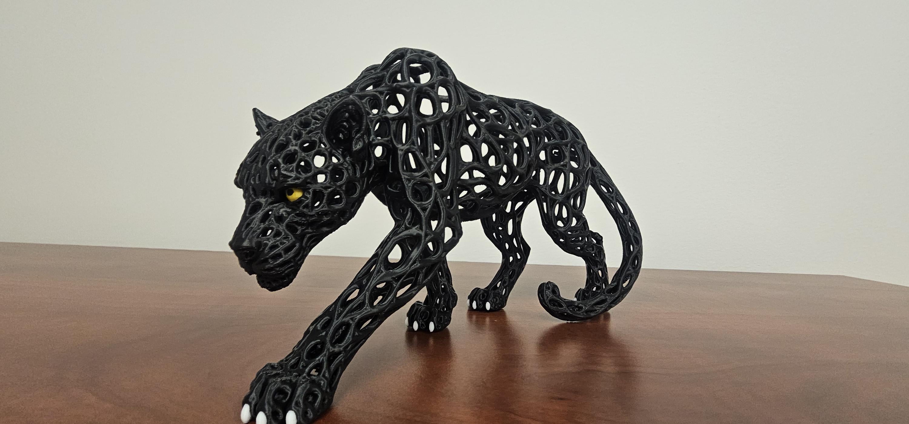 3D printed black voronoi panther sculpture side view